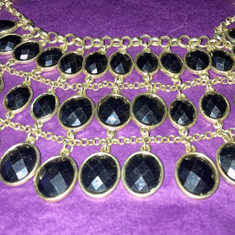 Egyptian style bib necklace in black and gold